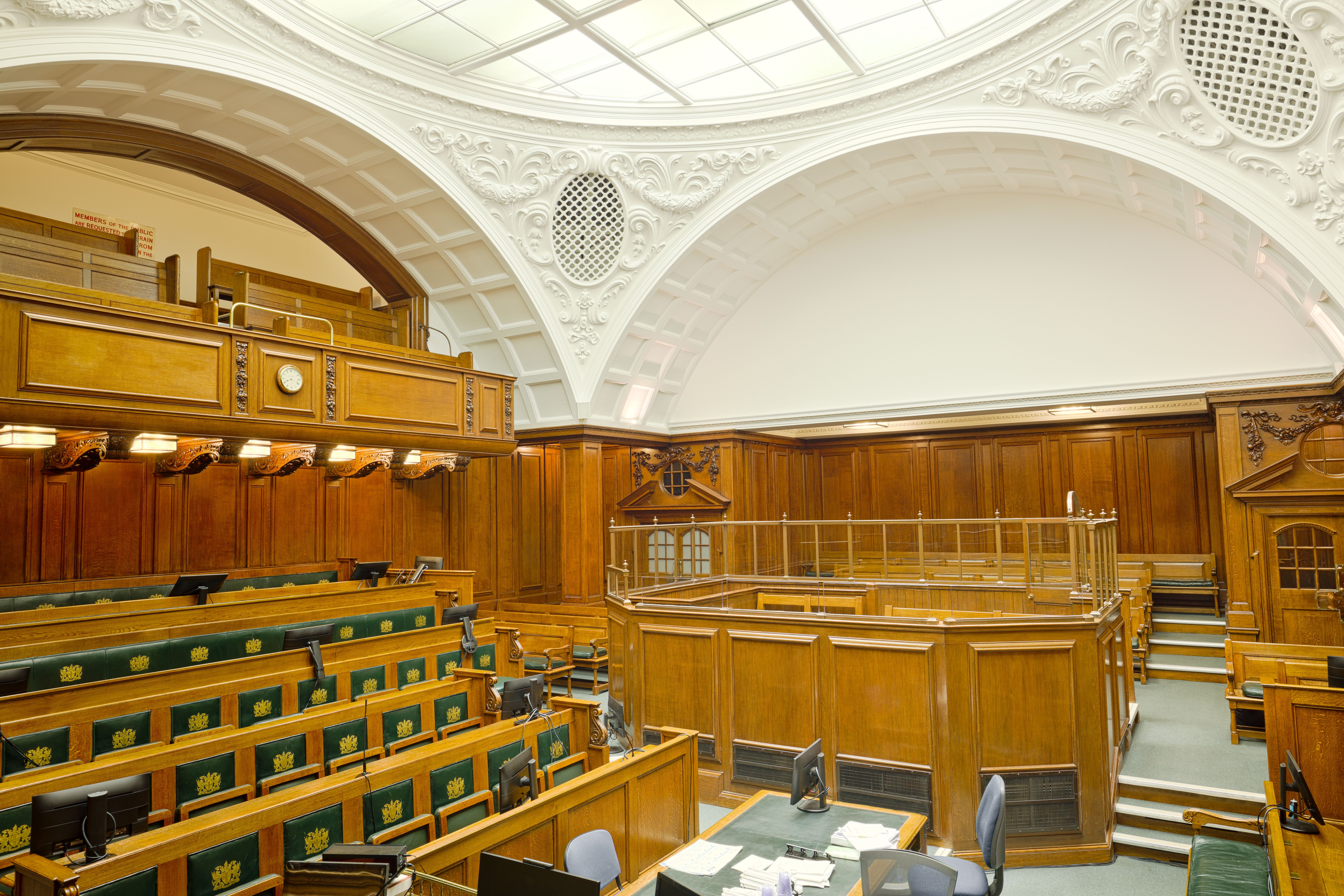 Interior of a historic London courtroom where group litigation orders are heard
